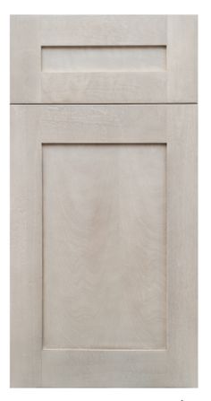 an unfinished cabinet door with the bottom panel painted white