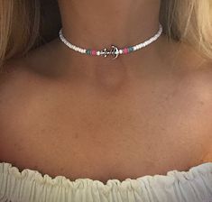 This is 13 inches (if need a little longer or shorter please convo me)This is a perfect necklace for the beach will definitely bring out that tan it is made out of white grade A Opaque Czech beads and a silver plated anchor also has hot pink beads and teal blue glass beads White Summer Beach Choker, White Adjustable Casual Choker, White Casual Adjustable Choker, Casual White Adjustable Choker, Trendy White Choker For Vacation, Casual White Beach Choker, White Casual Choker For Vacation, Casual White Choker For Vacation, Beach Choker