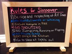 a chalk board with rules for sleepover written on it