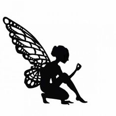 a black and white silhouette of a fairy sitting on the ground with her legs crossed