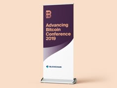 a roll up banner with the words advancing bitcoin conference 2019 written on it