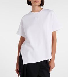 Cotton-blend T-shirt in white - Loewe | Mytheresa Modern Relaxed Fit Cotton Tops, Modern Cotton Top With Relaxed Fit, Trendy Tan Cotton Top, Modern Cotton Short Sleeve Tops, Modern Short Sleeve Cotton Tops, Tan Cotton Crew Neck Top, Modern Cotton T-shirt With Short Sleeves, Sporty Tan Cotton Tops, Sporty Tan Cotton T-shirt