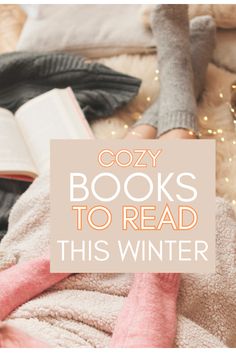 a person laying on top of a bed covered in blankets and reading a book with the words cozy books to read this winter