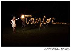 a woman holding sparklers in her hand with the word tastyon written on it