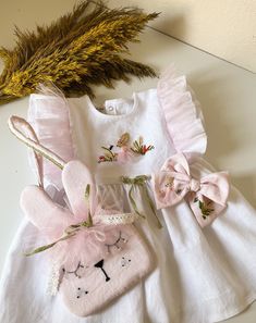 Bunny Embroidered Baby Girl Easter Linen Dress and Bunny Purse,Hair Clip, Kids Easter Dress, 1st Birthday Dress, Flower Girl Dress -- 🌸🐰 Dress your little one in the charming Dorothy Easter Bunny Dress! 🌷👧 This adorable outfit features a powder pink girl's dress adorned with delicate rabbit-themed details. 🎀 The dress comes with a cute rabbit cape to keep her warm and stylish. 🧥 Complete the look with fluffy bunny ears made of soft tulle. 🐇 Perfect for Easter celebrations and springtime f White Princess Embroidered Dress, White Princess Style Embroidered Dress, White Embroidered Princess Dress, Cute Baptism Dresses For Easter, Cute Dresses For Baptism And Easter, Cute Baptism Easter Dresses, Cute Baptism And Easter Dresses, Whimsical Dresses For Baptism In Spring, Whimsical Dresses For Spring Baptism