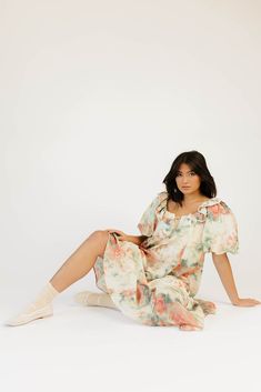 this vintage-inspired puff sleeve maxi dress is guaranteed to be your new go-to. it features a dainty ruffle neckline, dramatic puff sleeves, + a chic muted abstract floral pattern. with its relaxed silhouette + flowy shape, it’s the perfect maxi dress to pair with your favorite heels, boots, sandals, or sneaks. watercolor floral // scoop neckline, front tie, dramatic puff sleeves, pockets, contrast stitching on collar, lined model is 5'8" + wearing a small measurements are approximate + taken w Billowy Puff Sleeve Maxi Dress For Daywear, Feminine Floral Print Maxi Dress With Puff Sleeves, Feminine Floral Print Puff Sleeve Maxi Dress, Feminine Billowy Puff Sleeve Dress, Feminine Puff Sleeve Dress With Balloon Sleeves For Daywear, Feminine Puff Sleeve Midi Dress, Feminine Maxi Dress With Puff Gathered Sleeves, Feminine Daywear Maxi Dress With Puff Sleeves, Vintage Midi Dress With Puff Sleeves And Ruffles