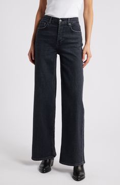 Enjoy a retro-chic, elongated look in these stretch-denim jeans cut with a high waist and full-length wide legs. 30 1/2" inseam; 22" leg opening; 12" front rise; 15" back rise (size 29) Zip fly with button closure Five-pocket style 98% cotton, 2% elastane Dry clean or machine wash, tumble dry Made in Turkey Modern Wide Leg Washed Black Jeans, Chic Wide Leg Flare Jeans In Washed Black, Chic Wide Leg Washed Black Flare Jeans, Modern Washed Black Wide Leg Jeans, High Rise Washed Black Flare Jeans, Modern High Rise Washed Black Bottoms, Modern Washed Black Wide Leg Bottoms, Modern High Rise Washed Black Jeans, Modern High-rise Washed Black Jeans