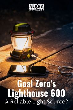 a light that is sitting on top of a wooden table with the words goal zero's lighthouse 600