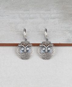 Wise Owl Dangle Drop Earrings 925 Sterling Silver with Clear Cubic Zirconia CZ Gemstones Artisan Crafted Vintage Inspired Material: 925 Sterling Silver Clear Cubic Zirconia CZ Gemstones Earrings Length: 1.60 inches Width: 0.90 inches Closure: Lever back Matching pendant is available https://www.etsy.com/listing/1027110377/wise-owl-pendant-necklace-925-sterling?ref=listings_manager_grid Comes with a gift pouch and box Free Domestic Shipping It is a gift that will create memories for years to come Nature Women, Gemstones Earrings, Owl Pendant Necklace, Owl Earrings, Fine Silver Jewelry, Create Memories, Wise Owl, Unique Nature, Owl Pendant