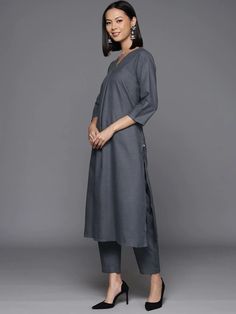 Redefine classics with our kurta sets. This stunning set was crafted from the finest cotton blend in a striking sharp grey hue making it a chic sartorial pick for a stylish office soiree or a quick fun day out with friends and family. Add this stylish piece to your collection now! No. of pieces - 2 piece set. Color - Grey. Fabric - Cotton Blend. Washing Instructions - Dry Clean. Gray Straight Kurta For Festive Occasions, Elegant Cotton Sets For Diwali, Festive Elegant Cotton Kurta, Festive Gray Long Sleeve Sets, Cotton Kurta For Work With Long Sleeves, Cotton Kurta For Work And Eid, Classic Cotton Kurta For Semi-formal Occasions, Elegant Cotton Kurta For Formal Occasions, Festive Cotton Salwar Kameez For Formal Occasions