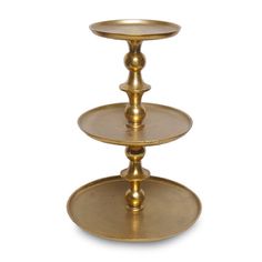 three tiered brass plate stand on white background