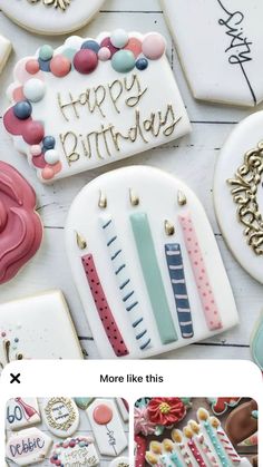 decorated cookies with happy birthday written on the top and bottom, along with other cookie decorations