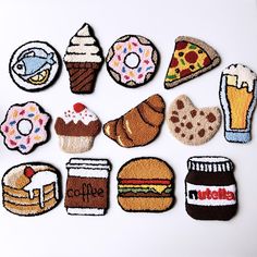 nine embroidered patches with different types of food and drinks on them, all decorated to look like they are made out of felt