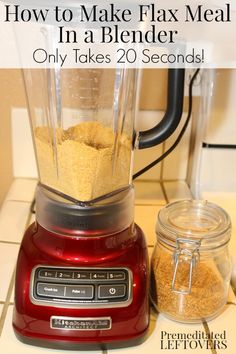 a red blender filled with food on top of a counter next to a glass jar