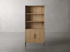 an empty wooden bookcase with two doors