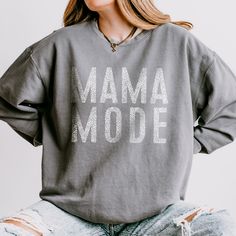 Our best selling Mama Mode design is back, and available in our core colors and styles! This Mama mode tee, hoodie or crewneck has been requested SO many times we knew we had to make it a part of our permanent collection! Our Core colors are perfect for any season, and can be dressed up or down for any outfit! DETAILS Unisex sizing - aka mens sizing. This fits a little more relaxed than our regular crewnecks and tees. 80/20 ring spun cotton/polyester, 3-end garment-dyed soft ring spun color blas Trendy Coffee Colored Crew Neck T-shirt, Mama Crewneck Sweatshirt, Relaxed Soft-washed Crew Neck Sweatshirt, Winter Coffee-colored Crew Neck Sweatshirt, Cotton Crew Neck Nursing T-shirt, Comfort Colors Tee, Comfort Colors, Dress Up, Crew Neck