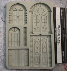 a plastic mold that looks like doors and windows