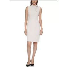 Women's New With Tags Size 12 Calvin Klein Sleeveless Tie Neck Sheath Dress In The Color Blossom - Very Light Pink Zip Closure Unlined Polyester Spandex Length (Shoulder To Bottom Hem): 38 In. Chest (Flat Across Under Arm): 18 In. Approximate Measurements Taken Laid Flat Size: Womens 12 Condition: New With Tags Calvin Klein Tie Neck Dress, Luxury Calvin Klein Spring Dresses, Little Black Lace Dress, Short Shift Dress, White Sheath Dress, Calvin Klein Black Dress, Very Light Pink, Black And Blue Dress, Pleated Skirt Dress