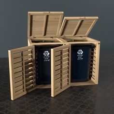 three wooden crates with two blue trash cans in them and one is open to reveal the contents