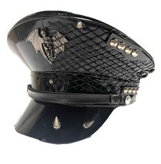 Gothic Punk Military black synthetic PVC peak hat with industrial net and metal spikes on peak  This is a Military style hat Please refer to photos. Available in size 57,58,59,60cm Please note:- Even though there is a choice of sizes, these are made to order and are customise to your requirements . I do not carry stock and hence do not do refunds. Please check the sizes before you commit to your purchase.  We are using expedite UPS services for most of our deliveries please send us email and phone details in massage to seller column.  Thank you It is brand new. Thank you for looking. Punk Brimmed Hats For Cosplay, Punk Style Adjustable Visor Hat, Adjustable Punk Visor Hat, Adjustable Punk Style Visor Hat, Punk Brimmed Hat For Alternative Fashion, Black Punk Brimmed Hats, Black Brimmed Punk Hat, Black Alternative Style Hat, Punk High Crown Costume Hat For Festivals