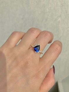 Introducing our newest redesign, this gorgeous, timeless ring features our favorite stunning sapphire and hand picked crystal ring. ✦ DETAILS ✦ ✧ Handcrafted ✧ 1.50 Carat center stone ✧ Natural gemstones ✧ Sizes 3.75-11.25 ✧ Gold over Sterling Silver 925 ✧ This ring will arrive ready to gift in a Kherish Jewelry Pouch. ✧ PRE-ORDER: Items that are preorder only will ship within 10-15 business days. You will receive an email with the updated processing time if you order a size/option that qualifie Elegant Crystal Ring With Prong Setting For Proposal, Fine Jewelry Cubic Zirconia Crystal Ring For Proposal, Cubic Zirconia Crystal Ring For Proposal, Proposal Cubic Zirconia Crystal Ring, Elegant Lab-created Sapphire Ring For Proposal, Elegant Solitaire Crystal Ring For Proposal, Proposal Sapphire Ring With Cubic Zirconia Accent Stones, Teardrop Cubic Zirconia Jewelry For Proposal, Lab-created Sapphire Jewelry For Proposal