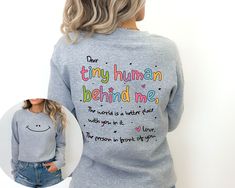 Dear Tiny Humans Behind Me, Teacher Sweatshirt, Inspirational Teacher Gift, Teacher Appreciation,Aesthetic Teacher Sweatshirt,Back To School Thank you so much for choosing us! How To Order 1️⃣ Please review all the information provided before placing an order. 2️⃣ Select the sweatshirt type and size using the drop down menu. 3️⃣ Select the color of the shirt using the following drop down menu. 4️⃣ Once all your desired items are in your cart you may complete your order by entering your payment m Meaningful Text Print Crew Neck Tops, Inspirational Crew Neck Top With Custom Print, Appreciation Aesthetic, Aesthetic Teacher, Teacher Sweatshirt, Teacher Inspiration, Gift Teacher, Tiny Humans, Teacher Gift