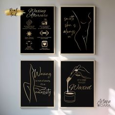 four black and gold posters on the wall