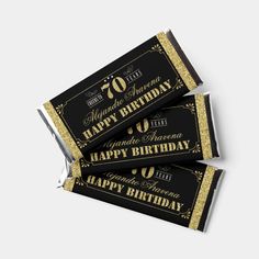 black and gold 50th birthday candy bar wrappers with golden glitter on the top that says 50 years happy birthday