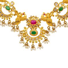 Our 22K Yellow Gold Guddapulsula Jewelry Set for women is perfect to wear for cultural ceremonies and other special occasions. The ultra feminine design of the necklace and matching chandbali earrings decorated with shimmering emeralds, rubies, pearls, and pearls is extremely flattering when paired with traditional wear or other formal looks. Features• 22K Yellow Gold.• Emeralds. • Rubies.• Pearls.• Cubic Zirconia.Specifications• Minimum Necklace Width - 2 millimeters • Maximum Necklace Width - 22k Gold Chandbali Kundan Necklace, Chandbali Peacock Design Temple Necklace For Celebrations, Peacock Design Chandbali Temple Necklace For Celebration, Reception Temple Necklace With Intricate Design, Festive 22k Gold Kundan Necklace For Reception, Navratri Bridal Necklace With Peacock Design, Traditional 22k Gold Kundan Necklace For Reception, Navratri Chandbali Bridal Necklace With Peacock Design, Navratri Bridal Chandbali Necklace With Peacock Design