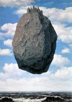 a large rock in the middle of an ocean with waves coming towards it and a sky background