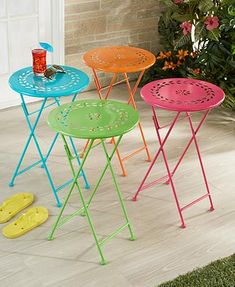 three colorful stools sitting next to each other