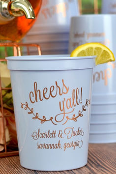 Slate blue 16 oz. plastic stadium cup personalized with 'Cheers Y'all' design and two lines of custom text in gold imprint color for wedding reception drinks. Wedding Drinks Reception, Wedding Cups Personalized, Wedding Reception Guest, Reception Drink, Stadium Cups, Wedding Festivities, Wedding Bags, April Wedding, Wedding Dessert