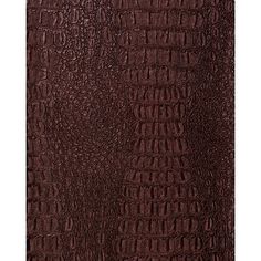 an image of a brown alligator skin textured upholstered fabric with dark red spots