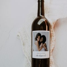 a wine bottle with an image of two women on it