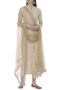 Beige all over floral motif front slit long kurta paired with matching pants and dupatta.
Components:3
Kamdani,thread embroidery
Neckline:Band collar
Sleeve Length:Full sleeves
Fabric:Georgette,net
Color:Beige
Closure: Pants: Side zip
Kurta: Front loop butttons
Dupatta: Floral details - Aza Fashions Chikankari Kurta Set, Beige Kurta, Corset Pants, Chikankari Kurta, Kurta Set For Women, Kurti Designs Party Wear, Indian Fabric, Anarkali Dress, Design Bedroom