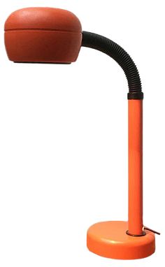 an orange desk lamp with a black cord on it's arm and a round light fixture attached to the base