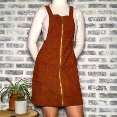 Shein Mini Overall Dress In Rust Brown. Size S Barely Ever Worn. Basically Brand New. - Corduroy - O-Ring Zipper - Pockets 65% Polyester, 35% Cotton (See Tag Photo For Machine Wash Info) Measurements: Length: 27 Inches Strap Length: 7 Inches Waist: 14 Inches Dresses Shein, Shein Dress, Tag Photo, Shein Dresses, Overall Dress, O Ring, Orange Red, Colorful Dresses, Overalls