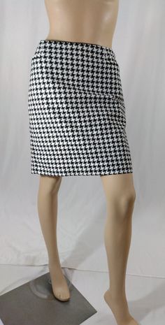 "Women's Skirt Black White Excellent Condition Vintage by WHITE HOUSE BLACK MARKET Size 8 Beautiful design and clean lines. Fitted waist , black and white houndstooth print with black trim on pockets, white satin lining, 98% COTTON 2% spandex stretchy woven super high quality fabric, side zipper. Like new condition. Super high quality. Designer lux expensive. Easy to wear casual chic vintage for the disco sporting life. MEASUREMENTS: Length - 19\" Waist - 34\" Hips - 40\" MODEL STATS: Ht. - 5' 8 Houndstooth Skirt, White Houndstooth, Chic Vintage, White Satin, Black Trim, Skirt Black, Vintage Chic, White House Black, White House Black Market