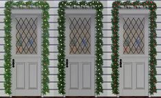 three doors decorated with christmas garland and lights