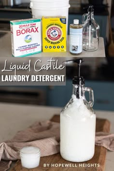 a bottle of liquid sitting on top of a wooden cutting board next to a container of laundry deterant