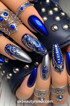 Blue is a popular color in nail art because it has many shades and looks great on all skin tones. This post lists 43 different blue nail designs that showcase the versatility of this color, from subtle pastel blues to vibrant royal blues, providing plenty of inspiration for your next manicure. Nail Designs Bling, Blue And Silver Nails, Fancy Nails Designs, Pretty Nail Art Designs, Blue Nail Designs, Blue Nail, Acrylic Nails Coffin Short, Pretty Nail Art, Glam Nails