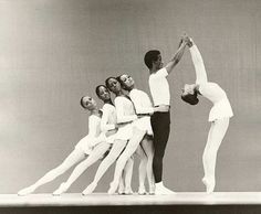 a group of ballerinas standing on top of each other