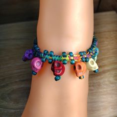 Elevate your jewelry collection with our handmade dangle hemp anklet with skull beads! Made with high-quality 0.5mm rainbow hemp, turquoise skull beads, and round Miyuki beads, this anklet is sure to add a unique touch to any outfit. At 10.5 inches in length and 2cm wide, it's the perfect size for most ankles. The dangle design brings movement and flair, while the skull beads add a hint of edginess. Handcrafted with care and attention to detail, this anklet is a one-of-a-kind piece that you won't find anywhere else. Don't miss out on this stylish accessory - shop now and make a statement with our hemp anklet! Skull Bead Jewelry, Hemp Anklet, Boho Hippie Style, Skull Beads, Beaded Skull, Saint Charles, The Skull, Miyuki Beads, Halloween Jewelry