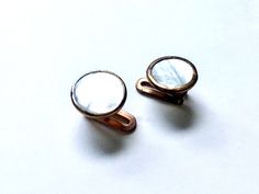 "These vintage cufflinks/tuxedo studs make an elegant and refined statement with their beautiful Mother of Pearl inset. They are marked with 50 stamp on the the back (50 would mean that a half carat (50 points) is set in the mounting) as well as a \"Double Colour\" trademark. Typical for 1920s elegance and style, these Art Nouveau cufflinks make a wonderful addition to a groom's suit or a black tie event outfit. The links are in excellent vintage condition but please handle with care. They would Vintage Formal Clip-on Earrings With Polished Finish, White Formal Clip-on Earrings, Classic Rose Gold Clip-on Earrings, Classic Adjustable Earrings For Formal Occasions, Formal Round Rose Gold Clip-on Earrings, Elegant Adjustable Clip-on Earrings For Formal Occasions, Screw Back Cufflinks For Wedding, Black Tie Event Outfit, Vintage Formal Wear