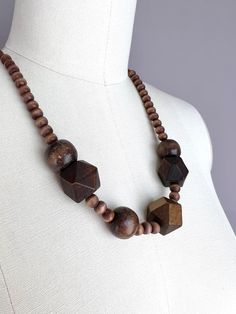 Brown wood necklace, long wooden necklace, nut-wood bead necklace, statement geometric necklace, stylish necklace, modern necklace, gift Beautiful natural wood bead necklace made from large dark wooden beads. It can be dressed up or worn more casually. Modern Necklace, Wood Bead Necklace, Wooden Necklace, Stylish Necklace, Wood Necklace, Geometric Necklace, Modern Necklaces, Necklace Statement, Necklace Long