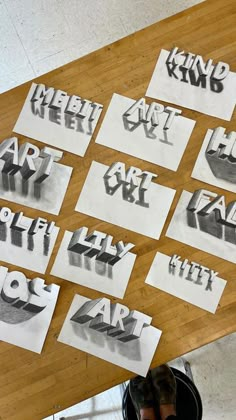 several pieces of paper cut into the shape of letters