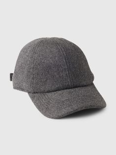 a gray hat on a grey background with the word's name written in black