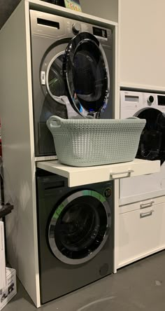 a washer and dryer stacked on top of each other