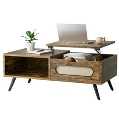 a wooden table with drawers and a laptop computer on top, in front of a white background