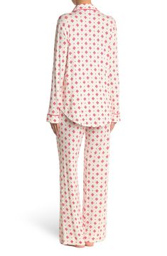 A soft jersey knit pajama set with a pretty print delivers feminine style and essential comfort. 2-piece set Shirt: 25" length (size S); Pants: 9.5" rise, 32" inseam (size S) Shirt: notch lapel, long sleeves, front button closures, chest patch pocket, allover print, contrast piping, knit construction Pants: elasticized waist, pull-on style, allover print, knit construction 95% rayon, 5% spandex Machine wash cold Imported Model’s stats for sizing: 5’11” height, 32” bust, 24” waist, 34” hips. Mode Casual Printed Long Sleeve Sleepwear, Casual Long Sleeve Printed Sleepwear, White Long Sleeve Relaxed Fit Sleepwear, Printed Relaxed Fit Tops For Pajama Party, White Printed Long Sleeve Sleepwear, Long Sleeve Printed Loungewear Sets, Long Sleeve Printed Lounging Sets, Printed Long Sleeve Lounging Sets, Long Sleeve Printed Lounge Sets